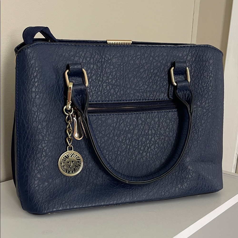 Navy Blue textured satchel handbag with gold-tone hardware and a lion head charm